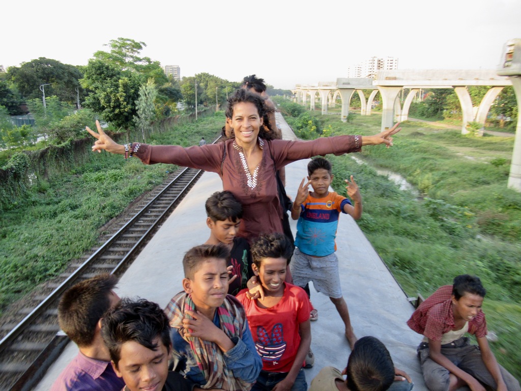 riding on the top of a train in Bangladesh