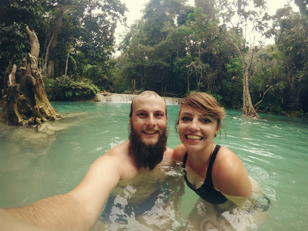 Having a dip in Kuang Si Falls in Laos